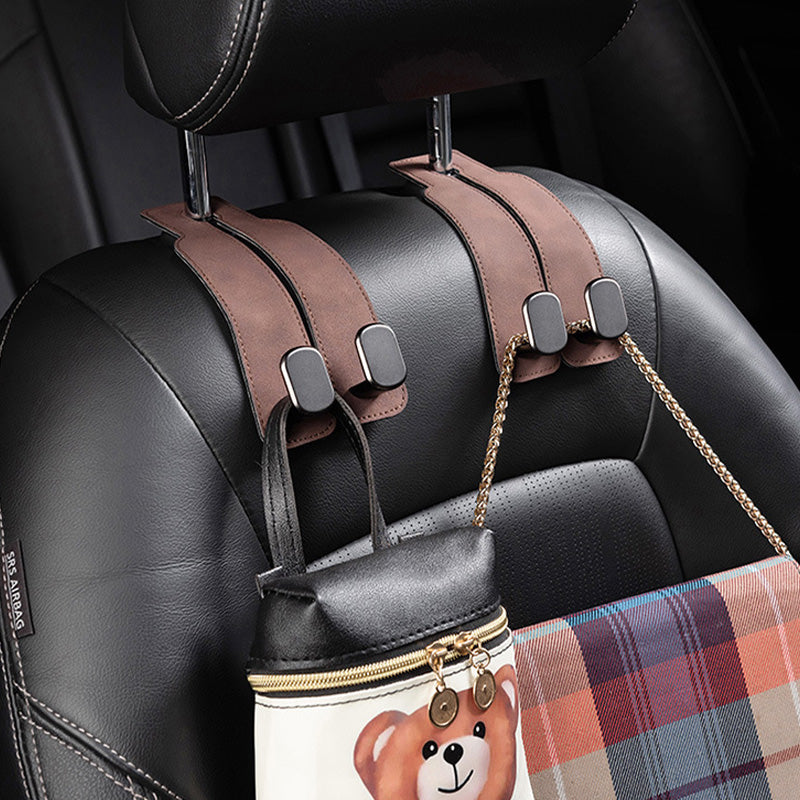 🚗 Crochets universels pour appuie-tête de voiture | Fabriqués en cuir PU souple 👜 | Structure robuste en alliage de zinc 💪 | Organisez l'espace intérieur ✨