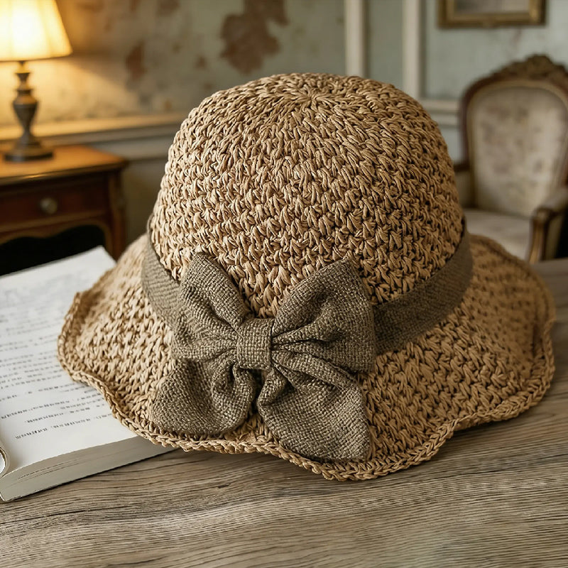 Chapeau de soleil élégant en paille tressée avec nœud