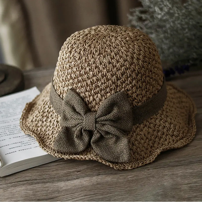 Chapeau de soleil élégant en paille tressée avec nœud