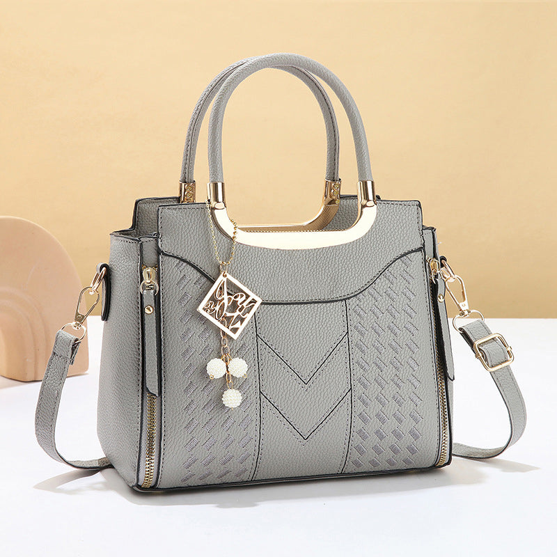 Élégant sac à main pour femme avec poignée supérieure et bandoulière